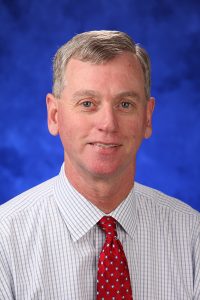 George Blackall, PsyD, is the director of the Office for a Respectful Learning Environment at Penn State College of Medicine. He is pictured in a professional photograph.