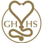 A stylized stethoscope that forms the shape of a heart with the letters "GH" to the left and "HS" to the right circumscribed by a circle.